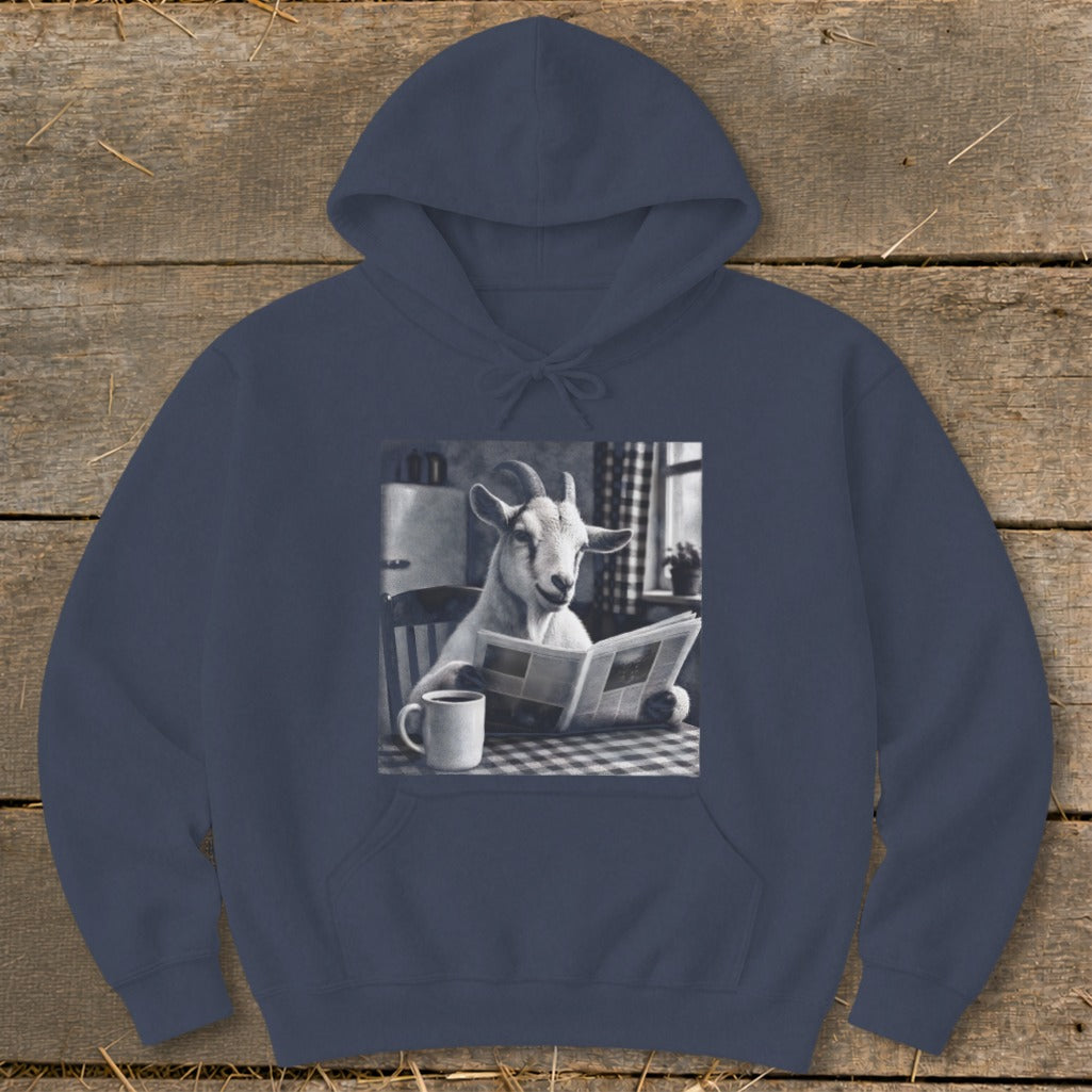 Navy blue hoodie featuring a graphic of a goat sitting at a table reading a newspaper beside a coffee mug.