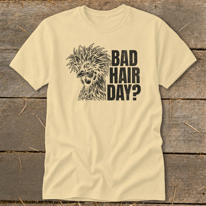 Light yellow t-shirt with black graphic of a fluffy chicken and text "BAD HAIR DAY?".