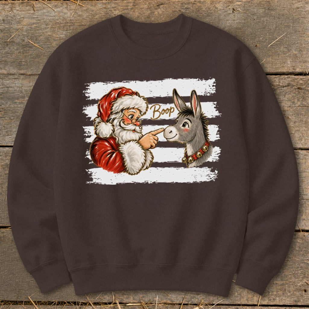 Santa Claus boops a donkey on the nose with text "Boop".