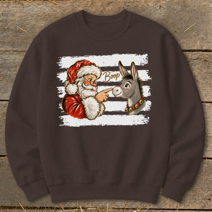Santa Claus boops a donkey on the nose with text "Boop".