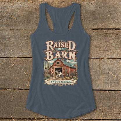 Tank top graphic with "Raised in a Barn and it Shows" and a goat by a barn.