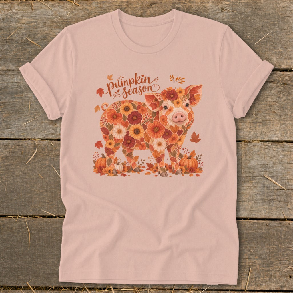 Pink t-shirt with a pig design made of autumn flowers and leaves.