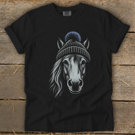 Black t-shirt with a white sketch of a horse wearing a blue pom-pom beanie.