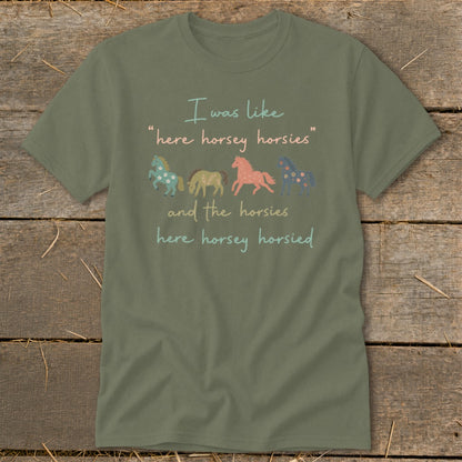 Olive t-shirt with four cartoon horses and text reading "I was like 'here horsey horsies' and the horsies here horsey horsied."