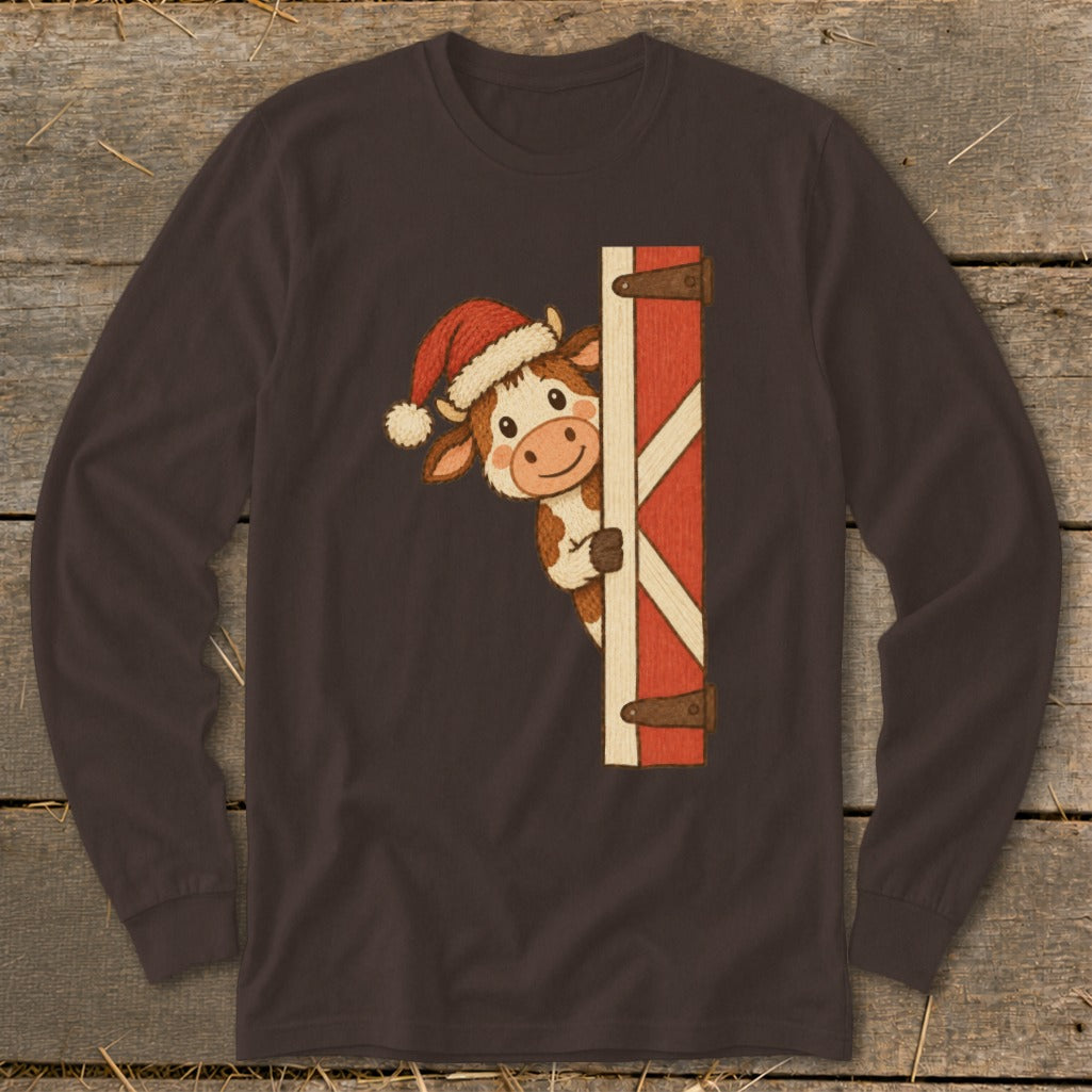 Brown long-sleeve shirt with a cow wearing a Santa hat peeking from behind a barn door.