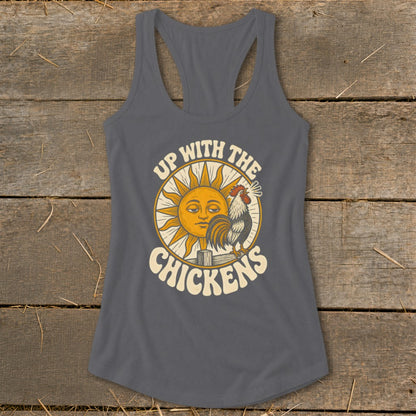 A charcoal gray women's racerback tank top featuring a graphic of a sun, rooster, and the text Up With The Chickens.