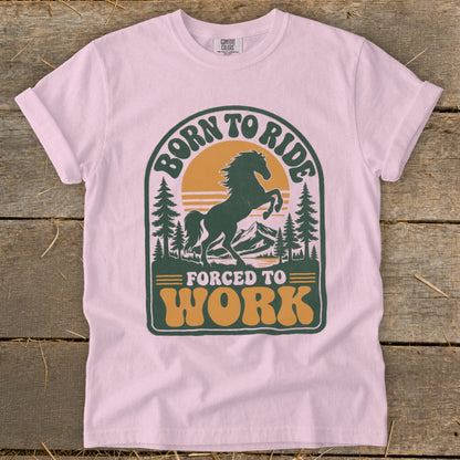 Pink t-shirt with "Born to Ride Forced to Work" graphic featuring a horse.