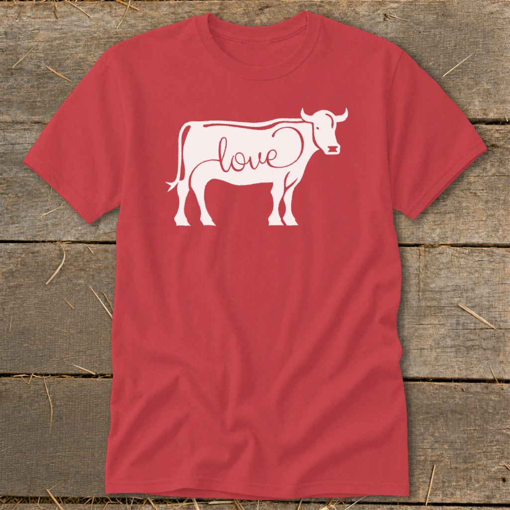 Red t-shirt with white cow outline graphic filled with the word "love".