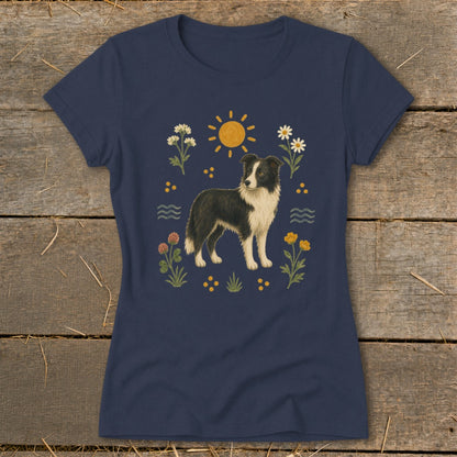 Navy t-shirt with a Border Collie dog surrounded by flowers, sun, and waves.