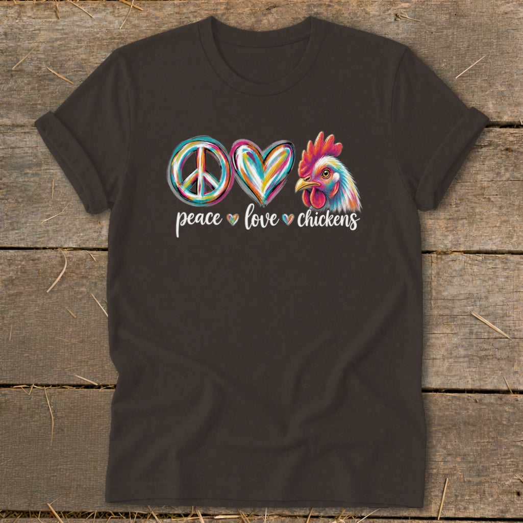 Dark t-shirt with peace, heart, and chicken graphic and text "peace love chickens."