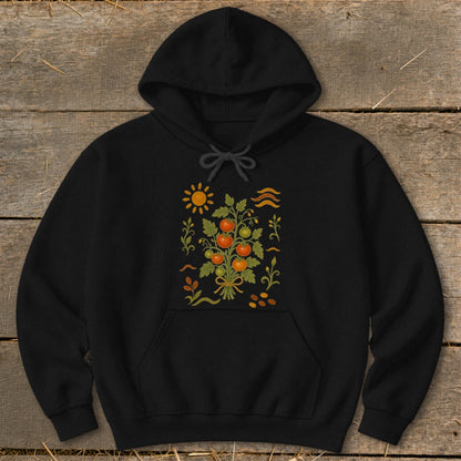 Black hoodie with a colorful tomato plant illustration and sun graphic.