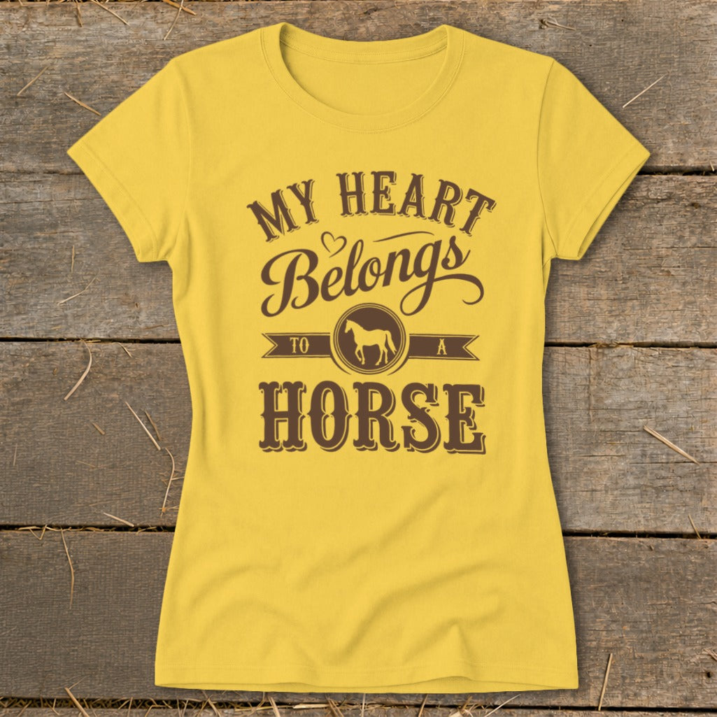 Yellow t-shirt with brown text: My Heart Belongs To A Horse.