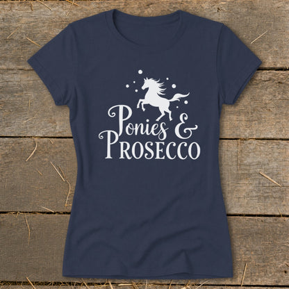 Navy t-shirt with white graphic: a running unicorn and text "Ponies & Prosecco".