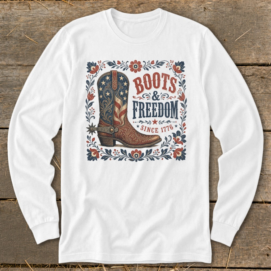 White long sleeve shirt with "Boots & Freedom Since 1776" graphic and cowboy boot.