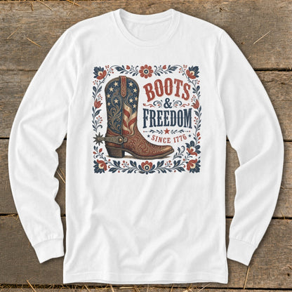White long sleeve shirt with "Boots & Freedom Since 1776" graphic and cowboy boot.