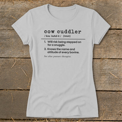 Light gray t-shirt with "cow cuddler" definition printed in black text.