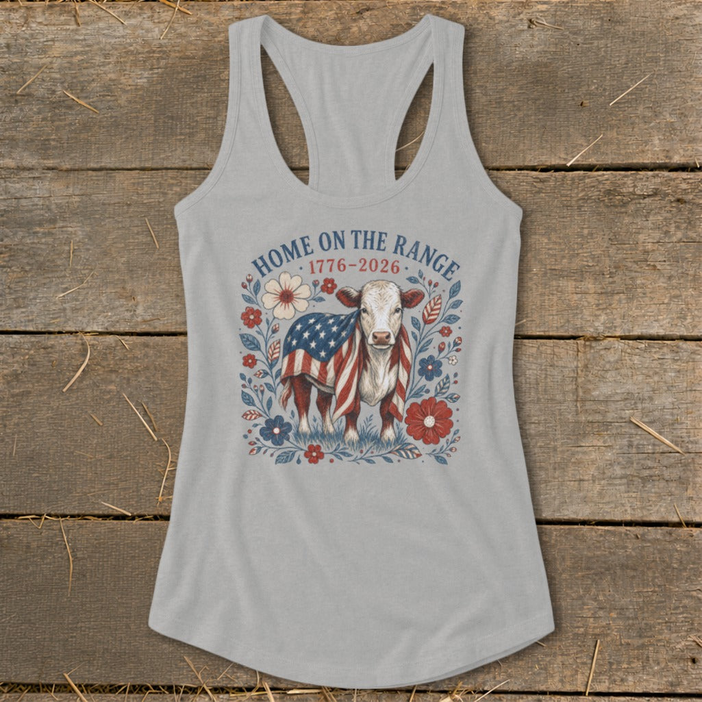 Cow draped in American flag, surrounded by flowers, text "Home on the Range 1776-2026".