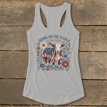 Cow draped in American flag, surrounded by flowers, text "Home on the Range 1776-2026".