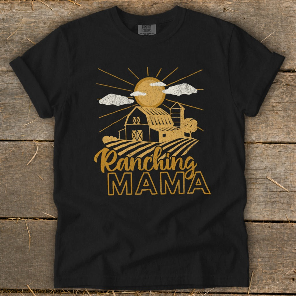 Black t-shirt with "Ranching MAMA" text and a barn graphic.