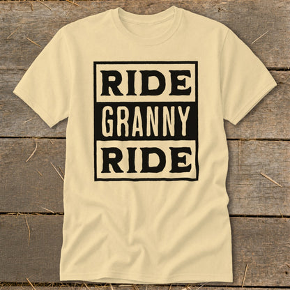 Light yellow t-shirt with black text "RIDE GRANNY RIDE" in three stacked boxes.
