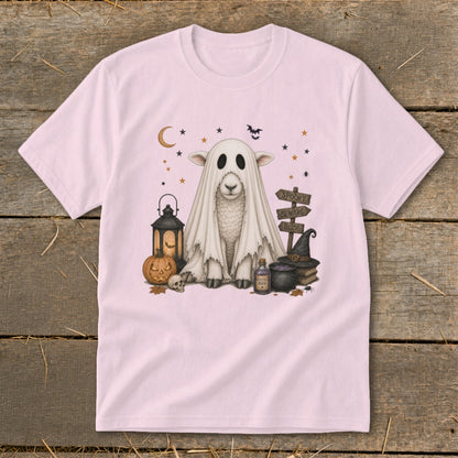 Sheep ghost with Halloween decorations, including a pumpkin, lantern, and signs.