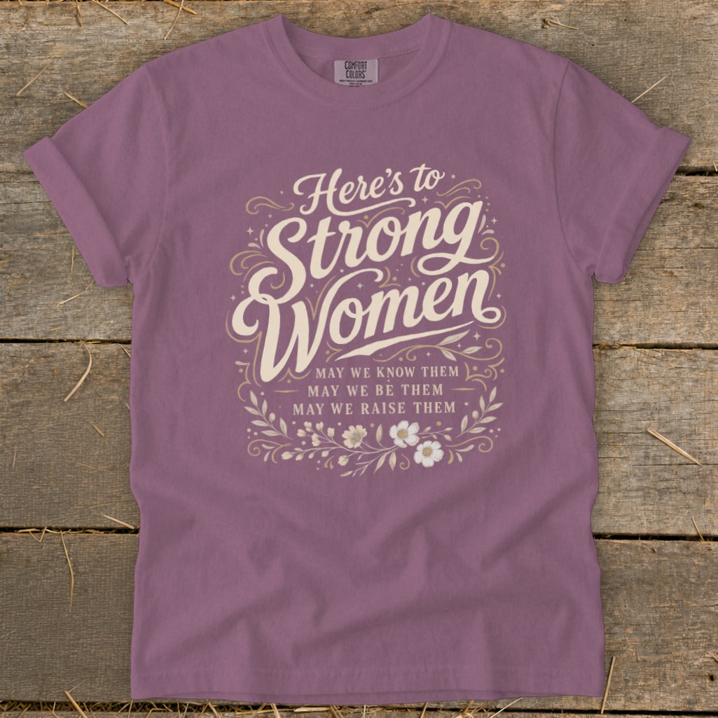 Mauve t-shirt with "Here's to Strong Women" text and motivational phrases.