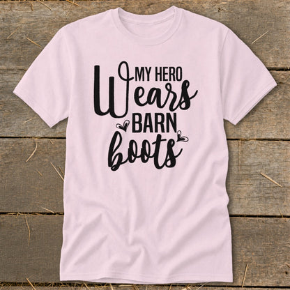 Light pink t-shirt with black text that reads "My Hero Wears Barn Boots."