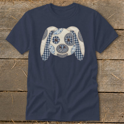 Navy t-shirt with a patchwork dog face applique on the chest.