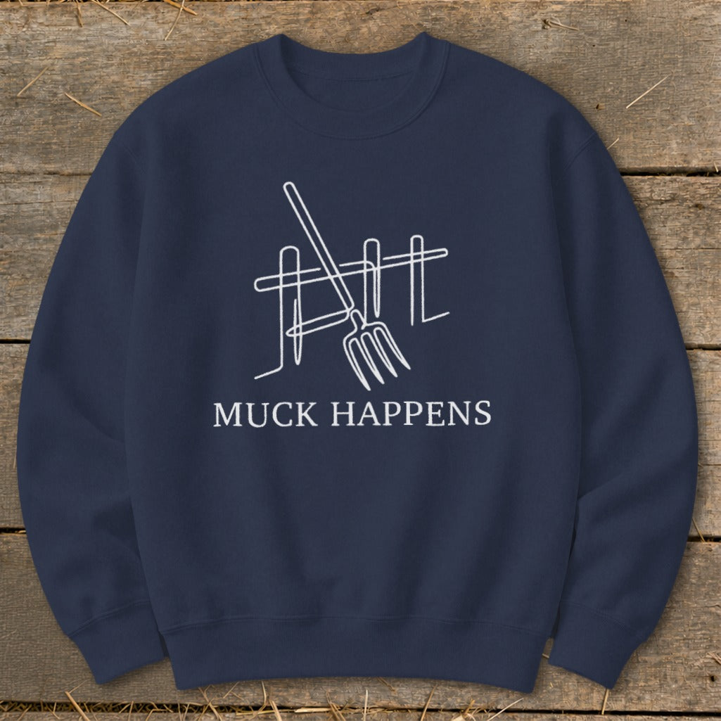 Navy sweatshirt with white line art of pitchfork and fence, text "MUCK HAPPENS".