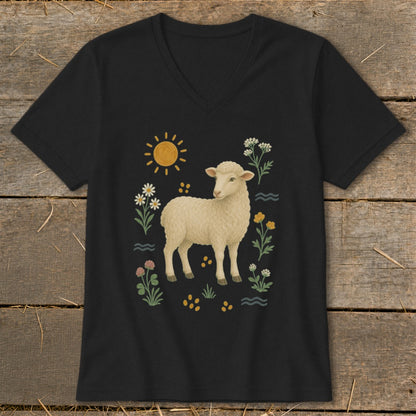 Black t-shirt with a cream sheep illustration surrounded by flowers and a sun.