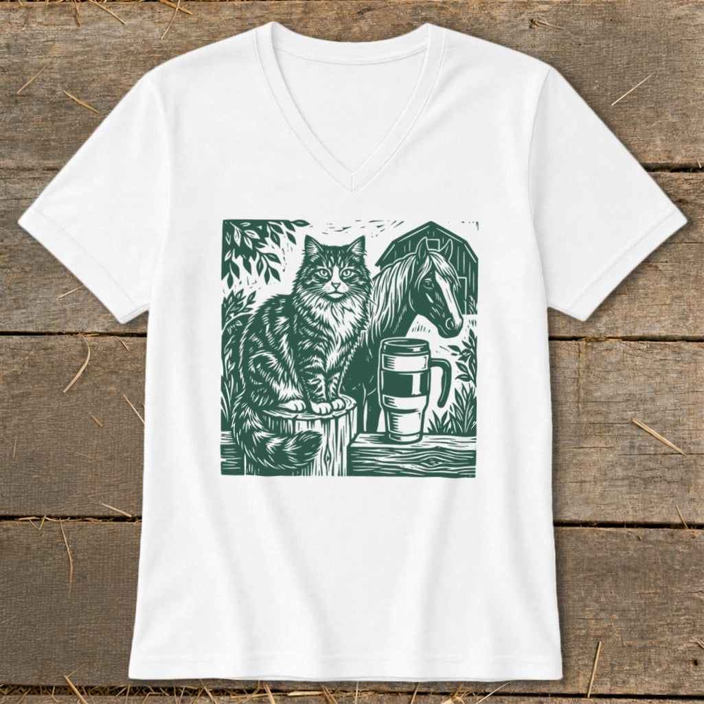 White v-neck t-shirt with a green linocut-style graphic of a cat, horse, and barn.