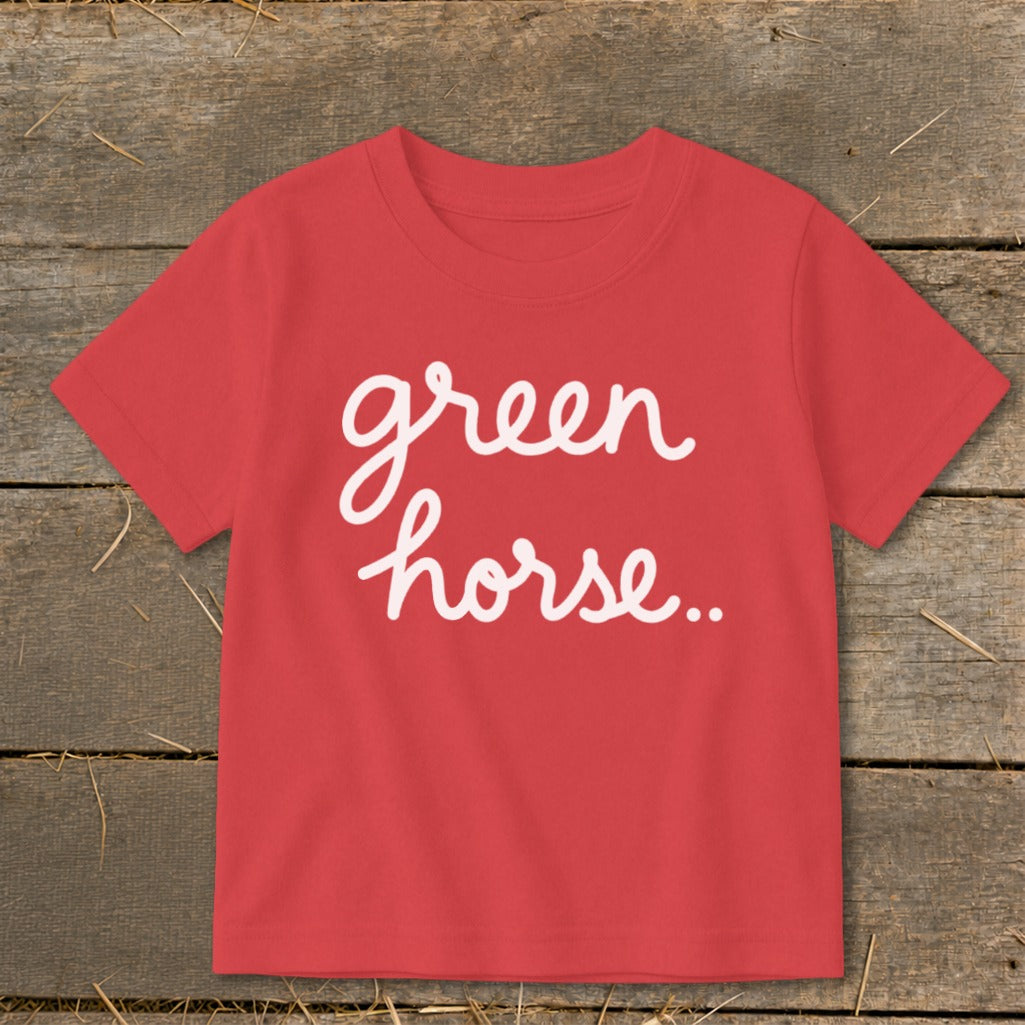 Red t-shirt with white script text "green horse.."