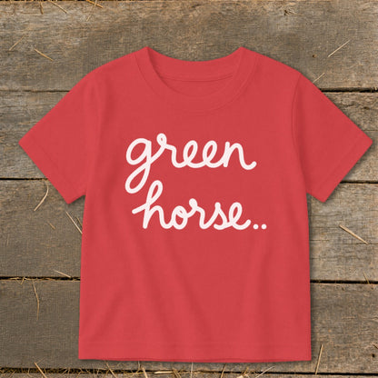 Red t-shirt with white script text "green horse.."