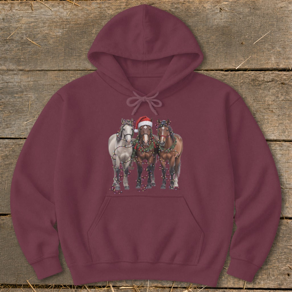 Maroon hoodie with three horses decorated with Christmas lights and one wearing a Santa hat.