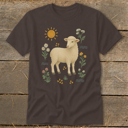 Brown t-shirt with a cream sheep surrounded by flowers, sun, and waves.