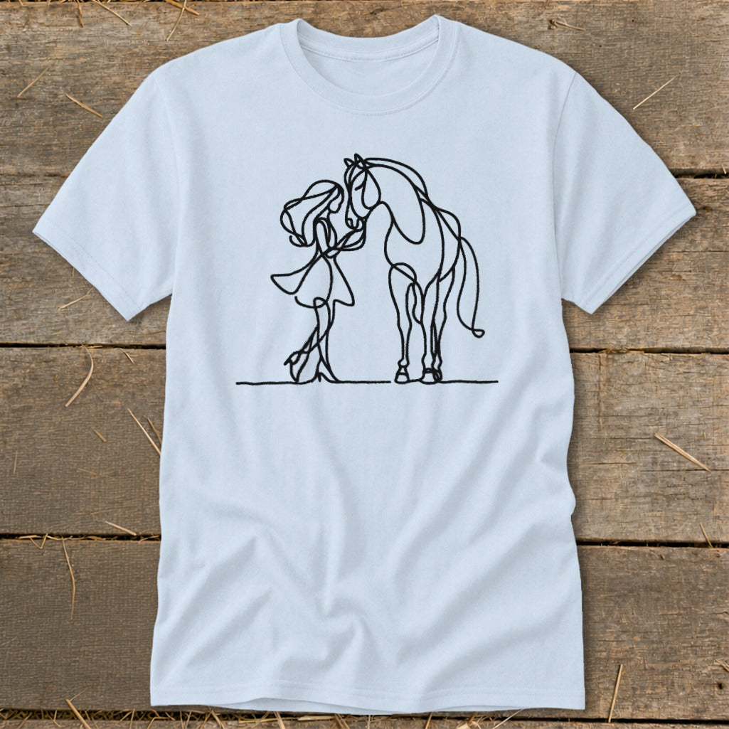 Light blue t-shirt with a black line art drawing of a girl and a horse.