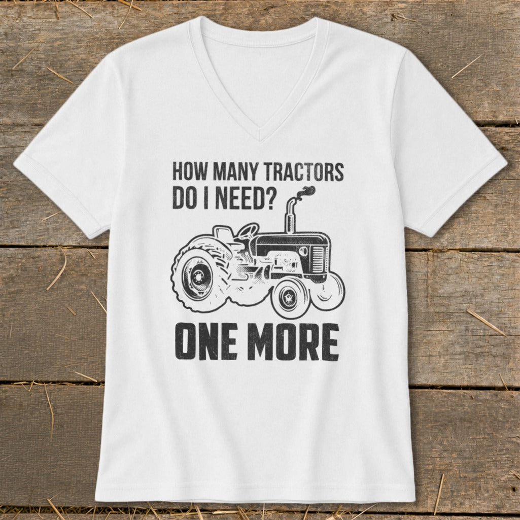 White v-neck t-shirt with a tractor graphic and text "HOW MANY TRACTORS DO I NEED? ONE MORE".