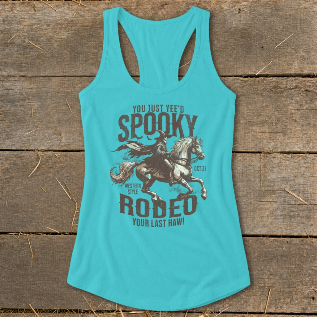Turquoise tank top with "Spooky Rodeo" design featuring a cowboy on a horse.