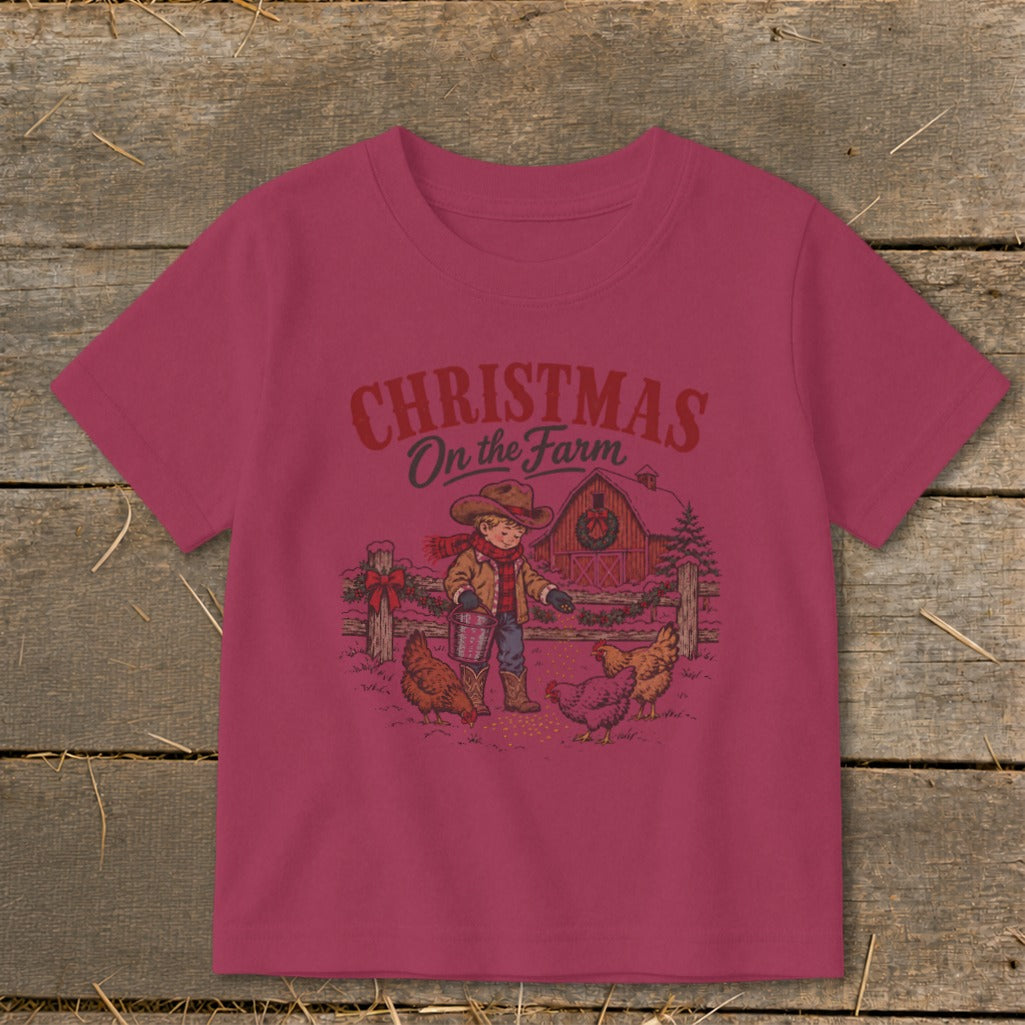 Christmas On the Farm graphic with a boy feeding chickens by a barn.