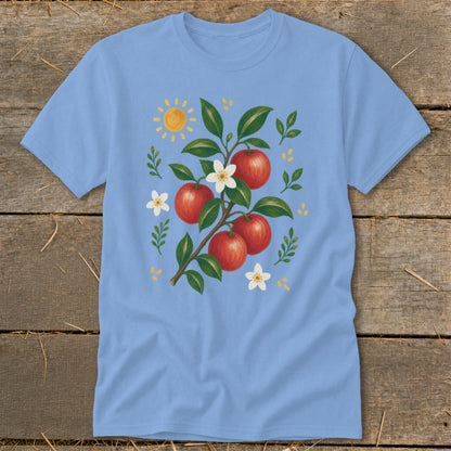 Light blue t-shirt with painted apples, leaves, flowers, and a sun.