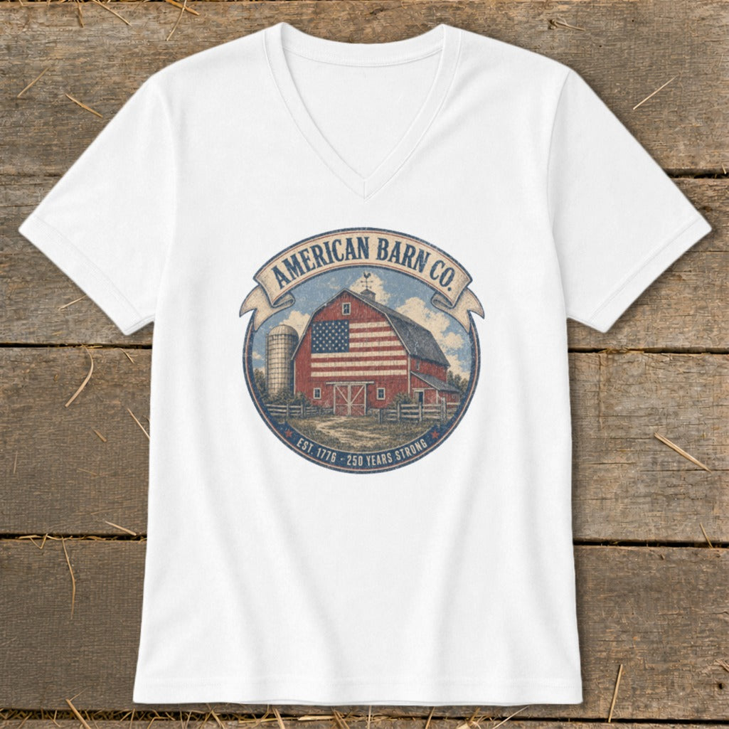 White v-neck t-shirt with American Barn Co. logo featuring a barn with American flag design.