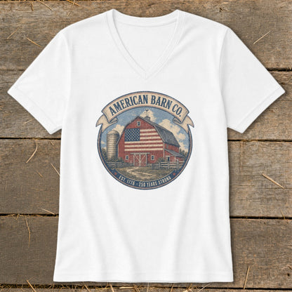 White v-neck t-shirt with American Barn Co. logo featuring a barn with American flag design.