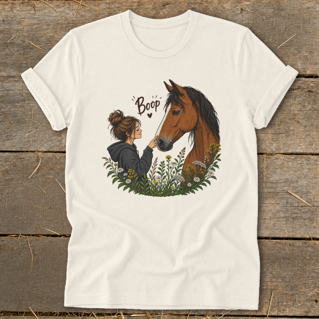 Illustration of girl touching horse's nose with "Boop" text above.