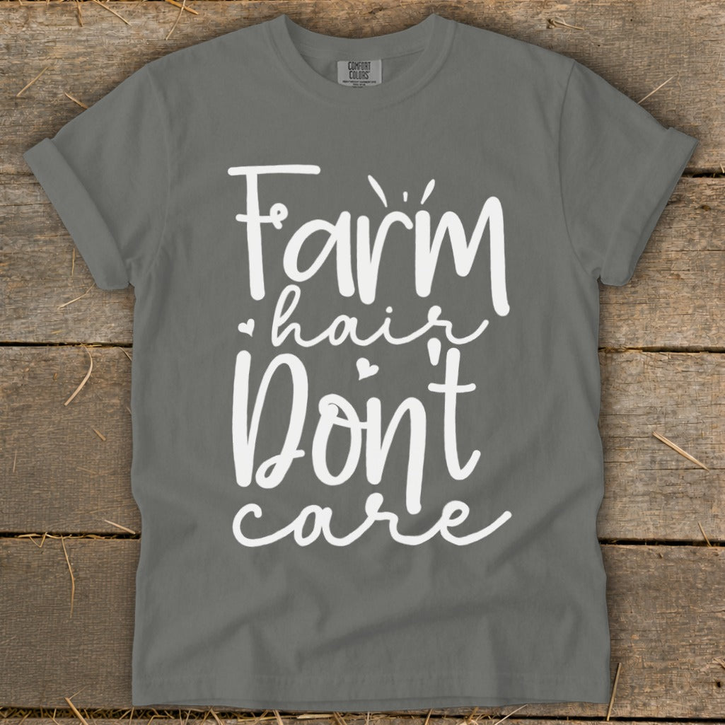 Gray t-shirt with white text reading "Farm hair Don't care".