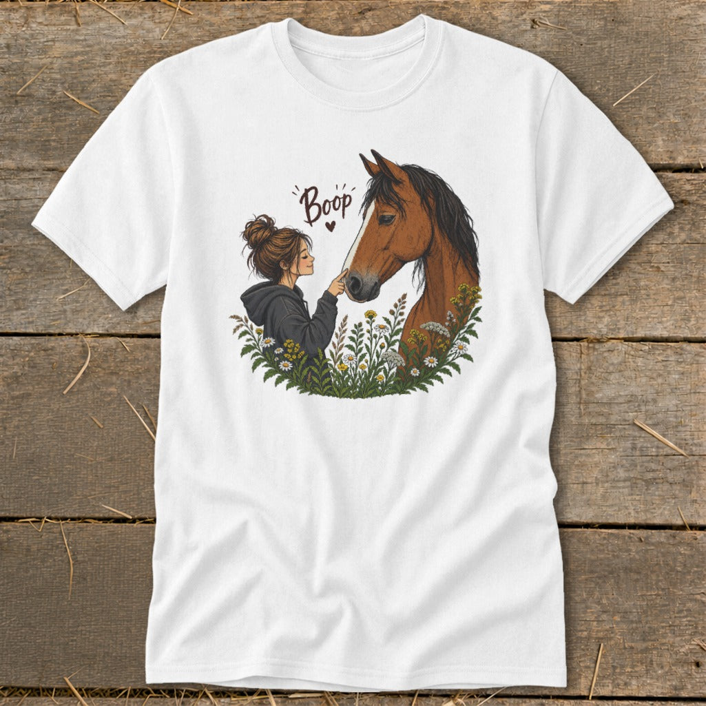 Illustration of a girl booping a horse's nose surrounded by flowers.