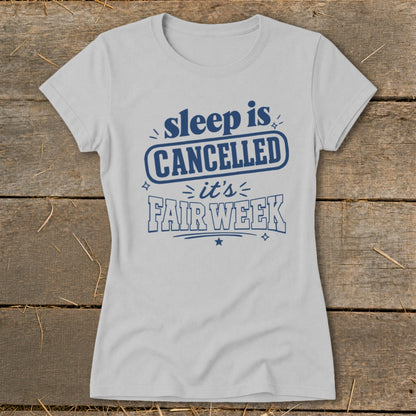 Light gray t-shirt with navy blue text: "sleep is CANCELLED it's FAIR WEEK".