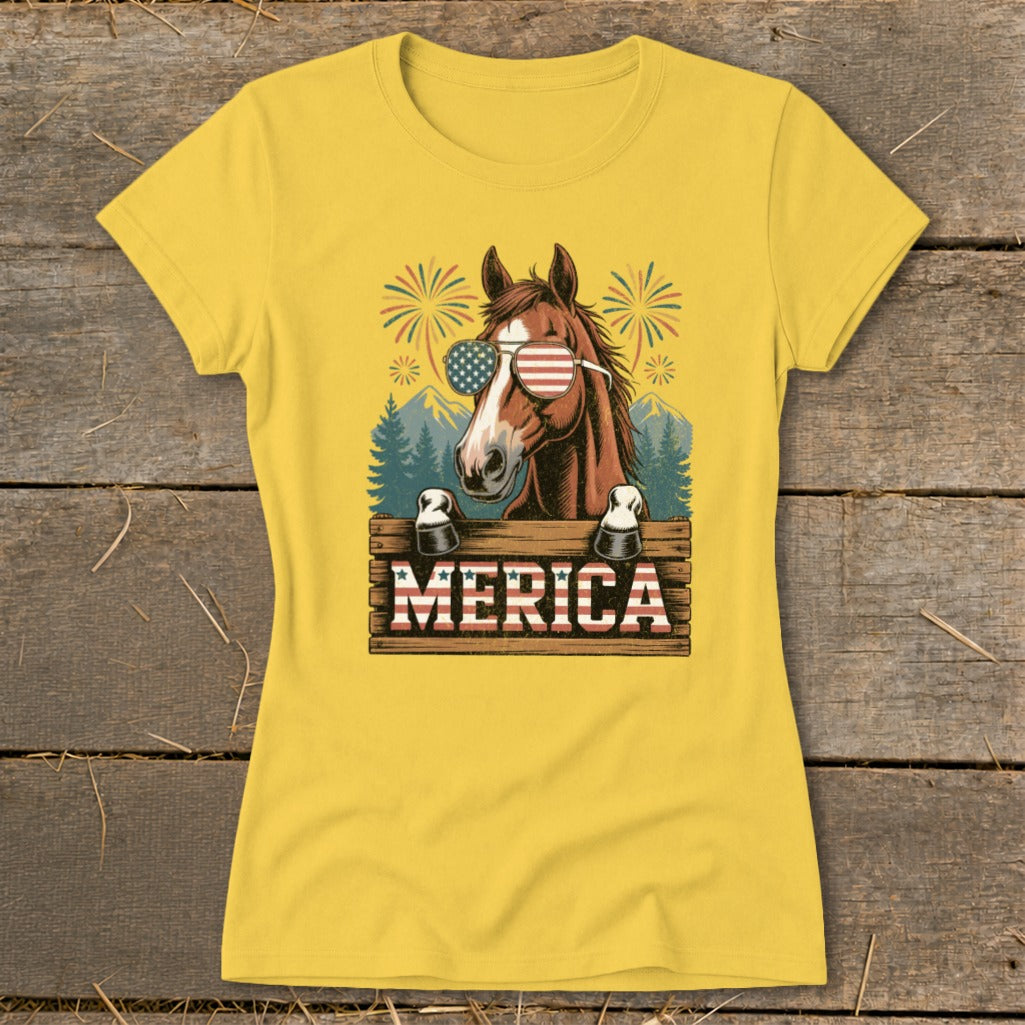 Horse wearing American flag sunglasses and holding a "MERICA" sign with fireworks.