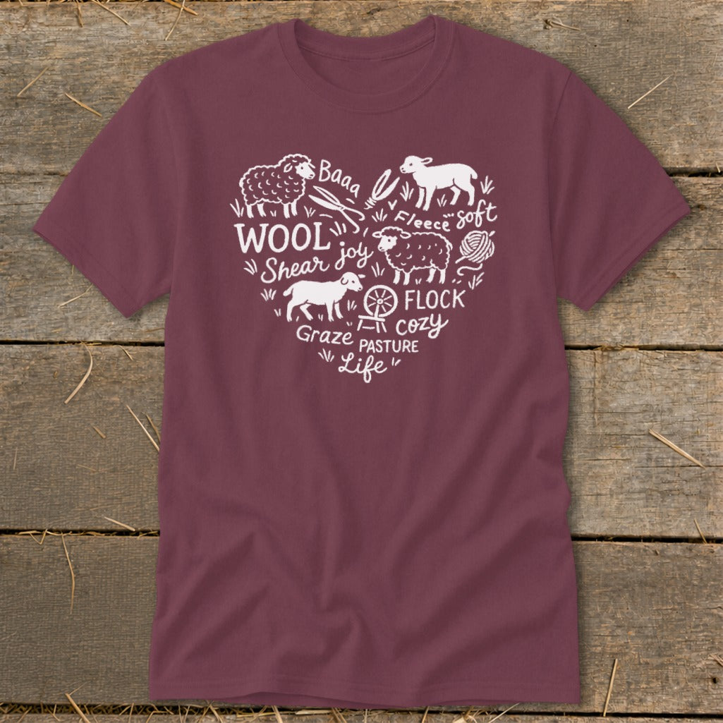 Maroon t-shirt with white heart-shaped graphic of sheep, wool, and farm words.
