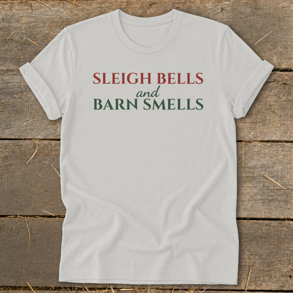 White t-shirt with text "Sleigh Bells and Barn Smells"