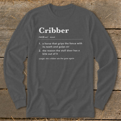 Dark gray long-sleeve t-shirt with white text defining the word cribber in dictionary style.